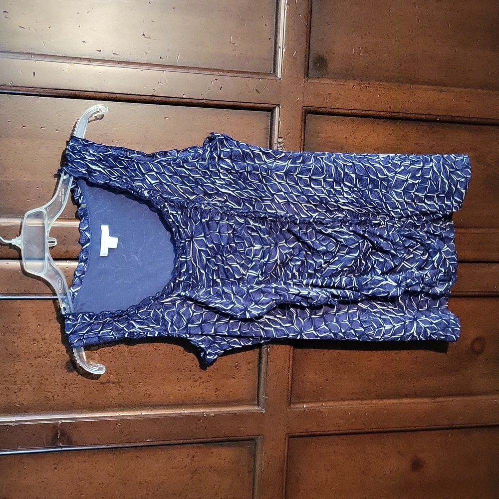 Short sleeve blouse with ruffles in the front from New York and company.